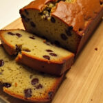 Freshly baked Easy Chocolate Chip Banana Bread with melted chocolate chips, ready to serve.